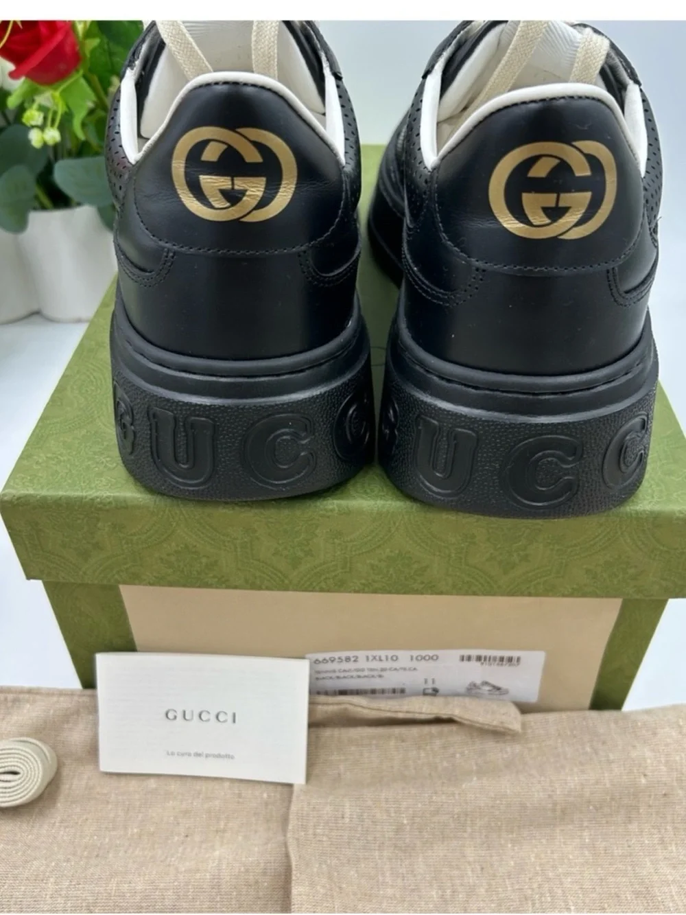Gucci, GG embossed, black leather sneakers size 11 fits 11.5 made in Italy
